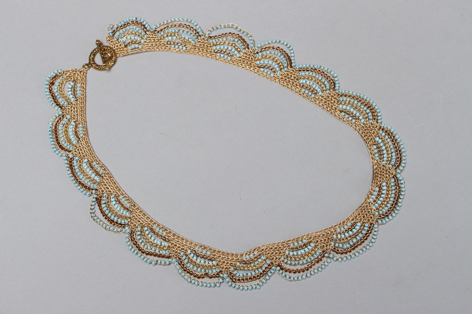 Gentle lacy crochet necklace with beads photo 1