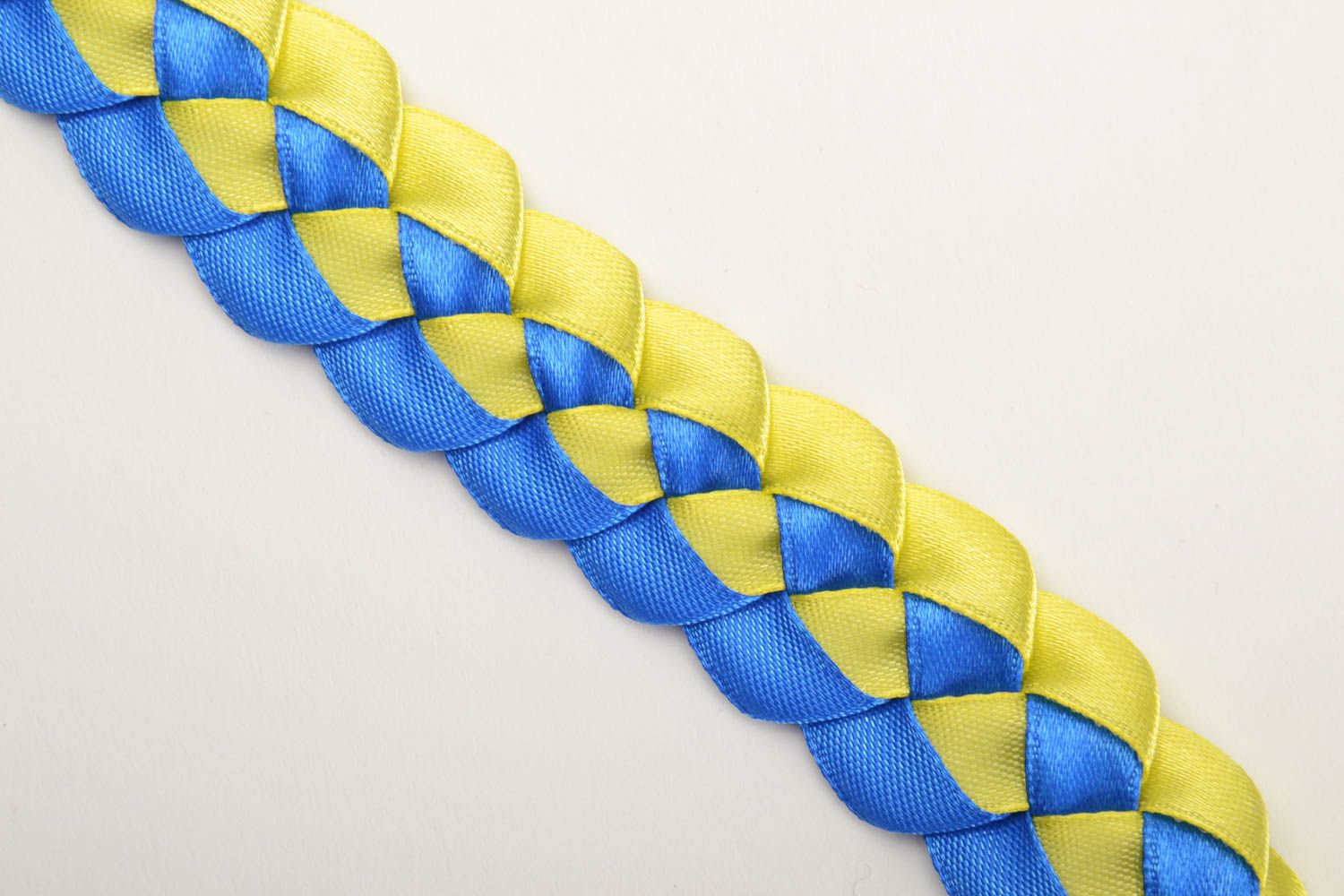 Handmade bright wrist bracelet woven of yellow and blue satin ribbons photo 2