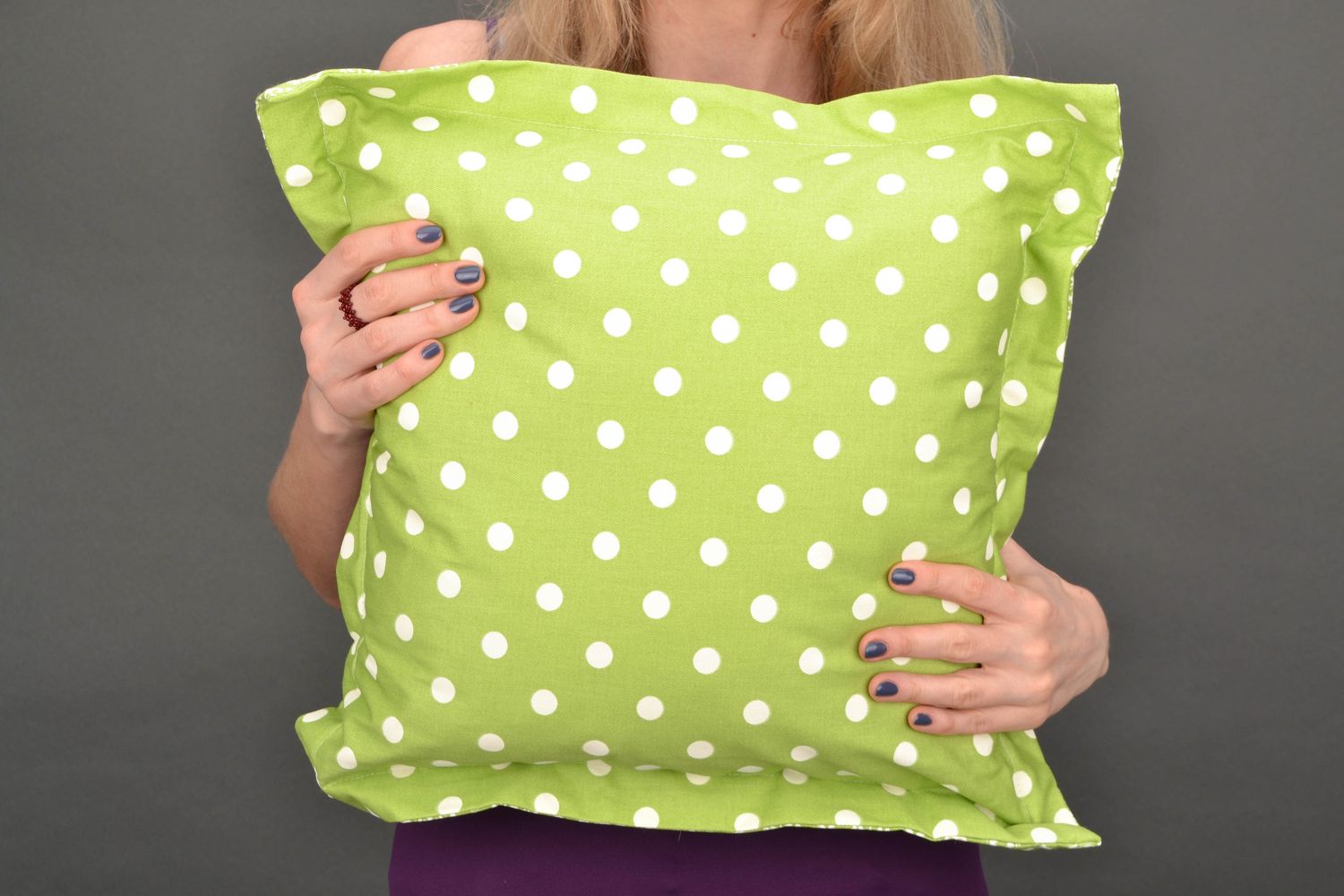 Handmade accent pillow of olive color with dotted print photo 1