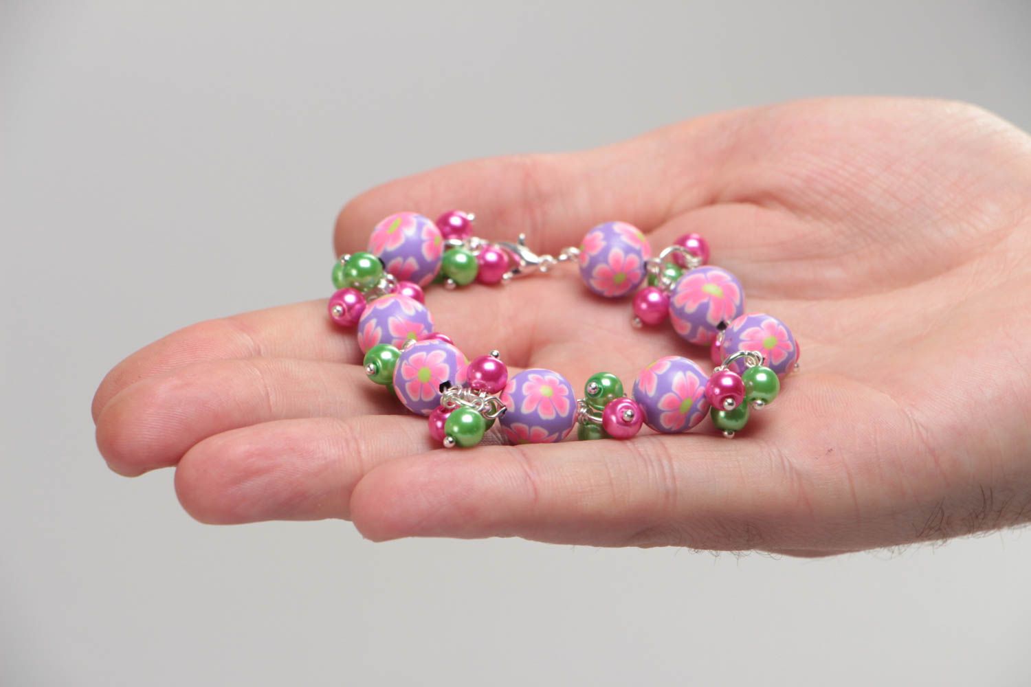 Handmade children's wrist bracelet with polymer clay beads and ceramic pearls photo 5