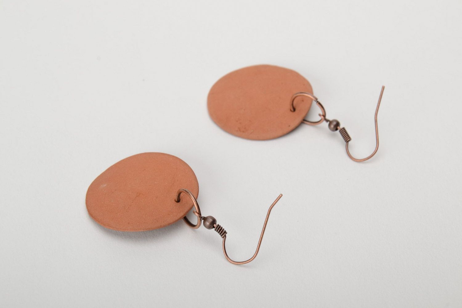 Women's round earrings hand made of brown clay with the image of Nefertiti photo 4