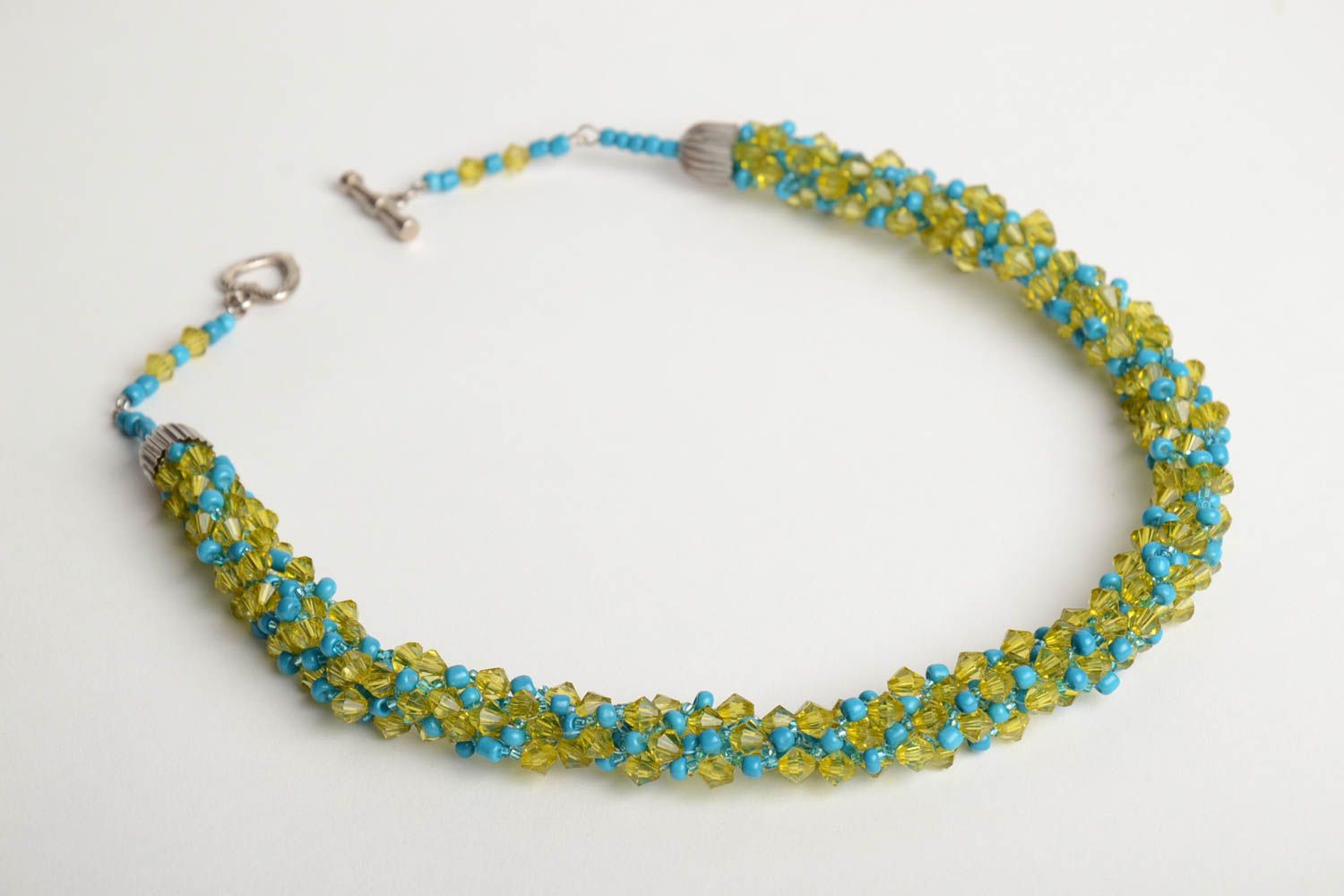 Handmade thin necklace crocheted of Czech beads in blue and yellow colors photo 3