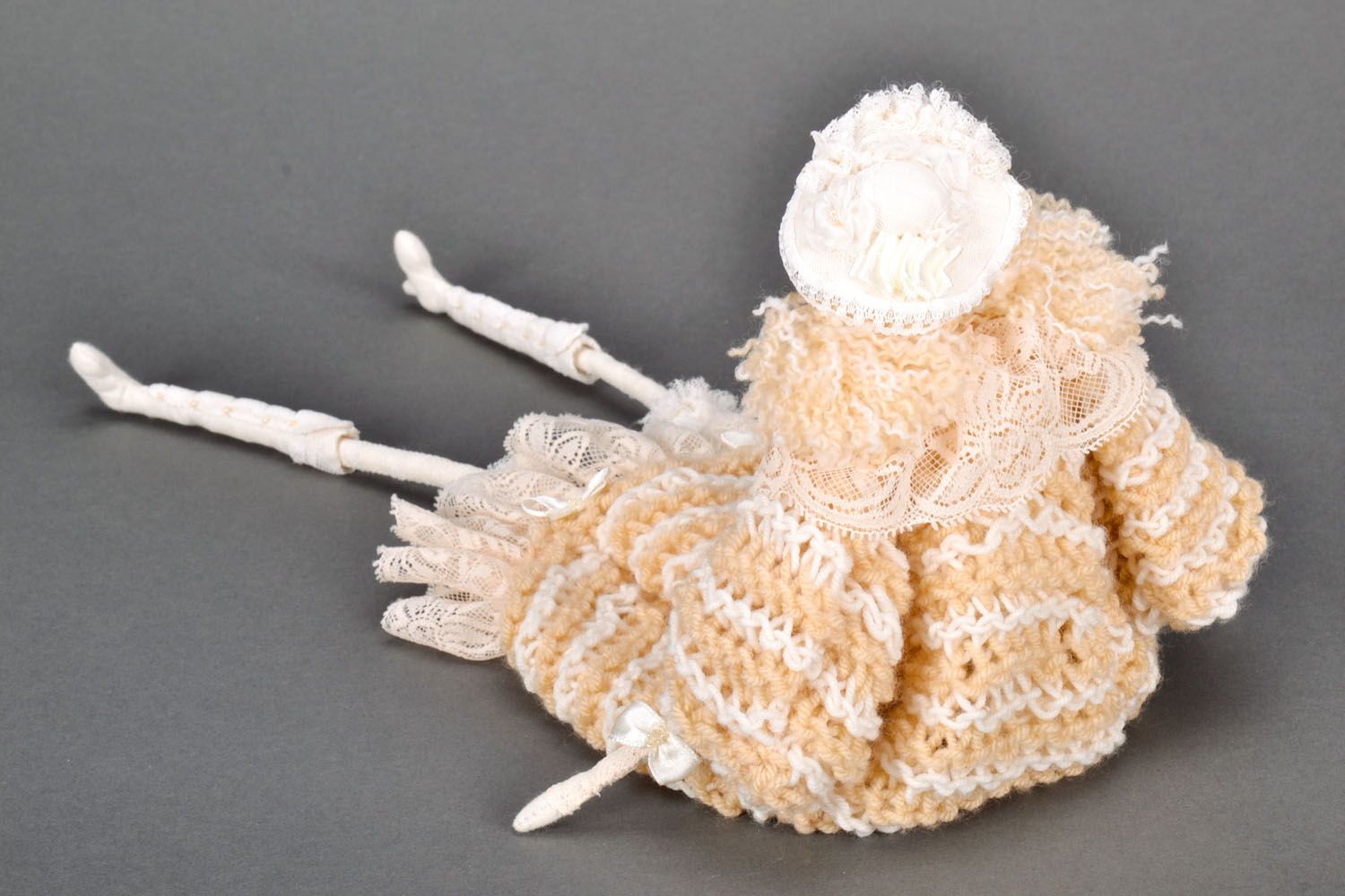 Designer knitted doll in cream dress photo 3