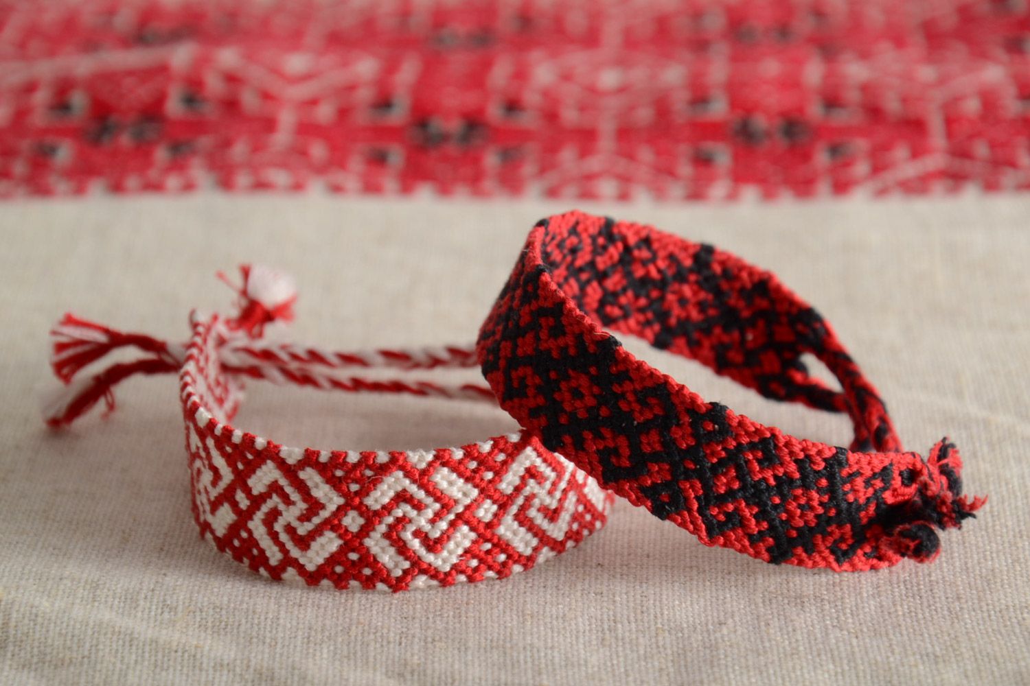 Set of 2 handmade friendship bracelets woven of red white and black threads  photo 1