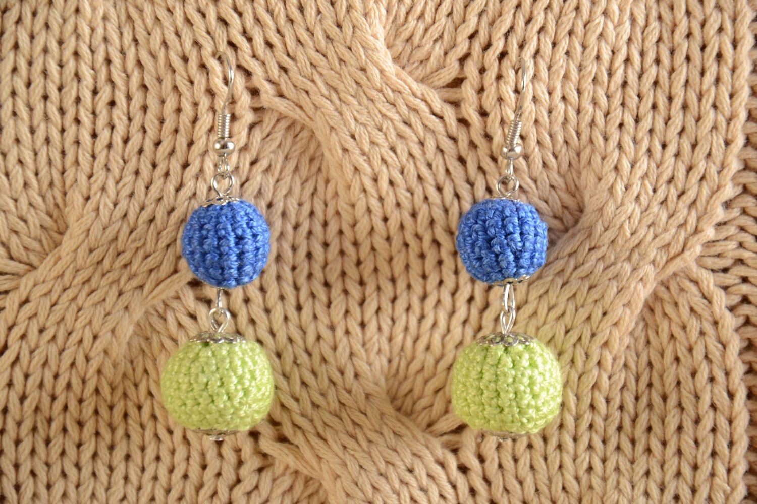Handmade earrings with beads crocheted over with yellow and blue threads photo 1
