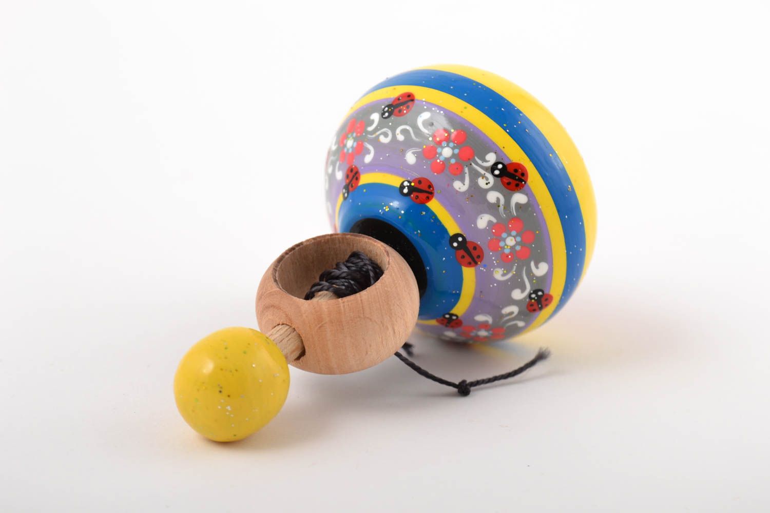 Peonza de madera hecha a mano regalo original juguete para niños con ornamentos foto 2