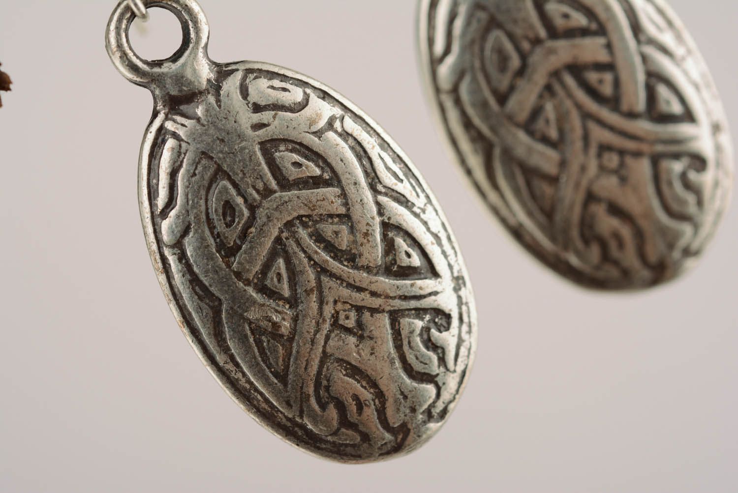 Metal earrings with ethnic pattern photo 2