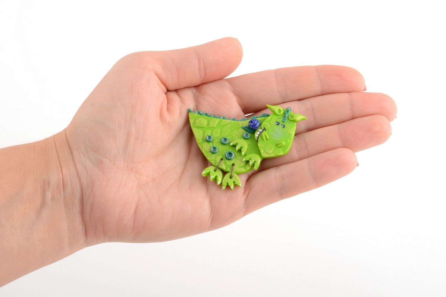 Broche de arcilla polimérica hecho a mano con forma de dragón verde infantil foto 5