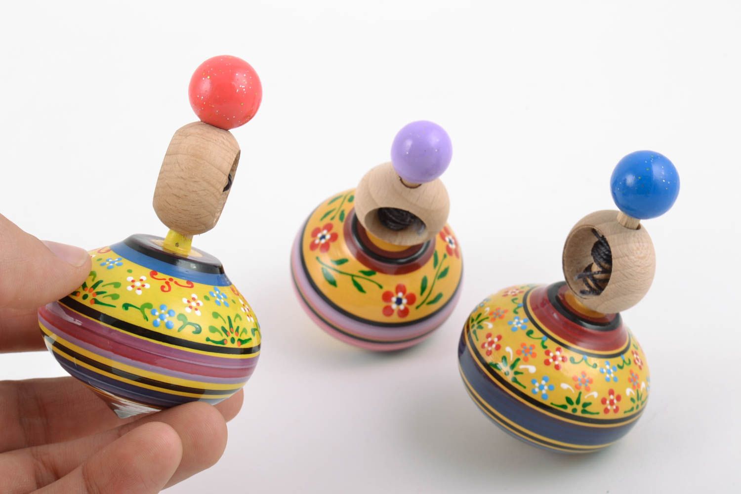 Handmade painted wooden toys set 3 pieces spinning tops with rings and strings photo 2