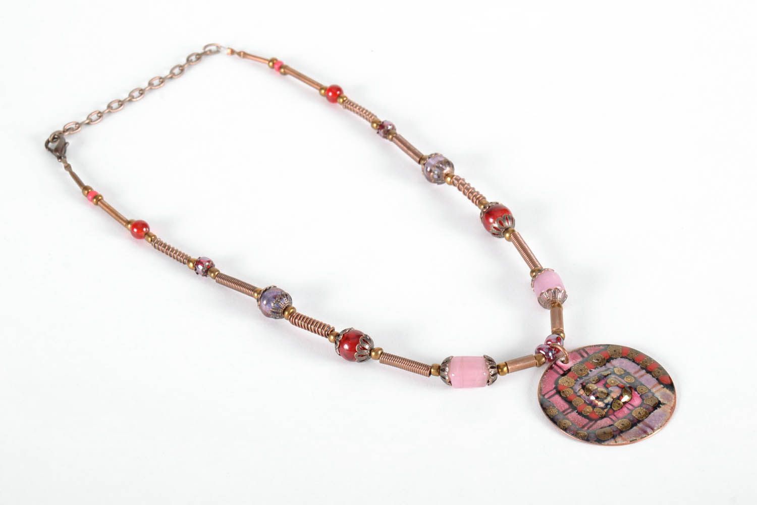Copper pendant with geometric pattern photo 4