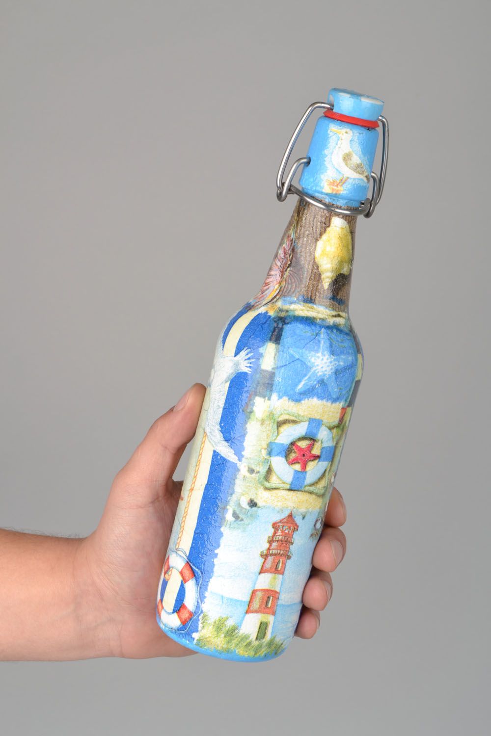 Botella artesanal en la técnica de decoupage foto 1