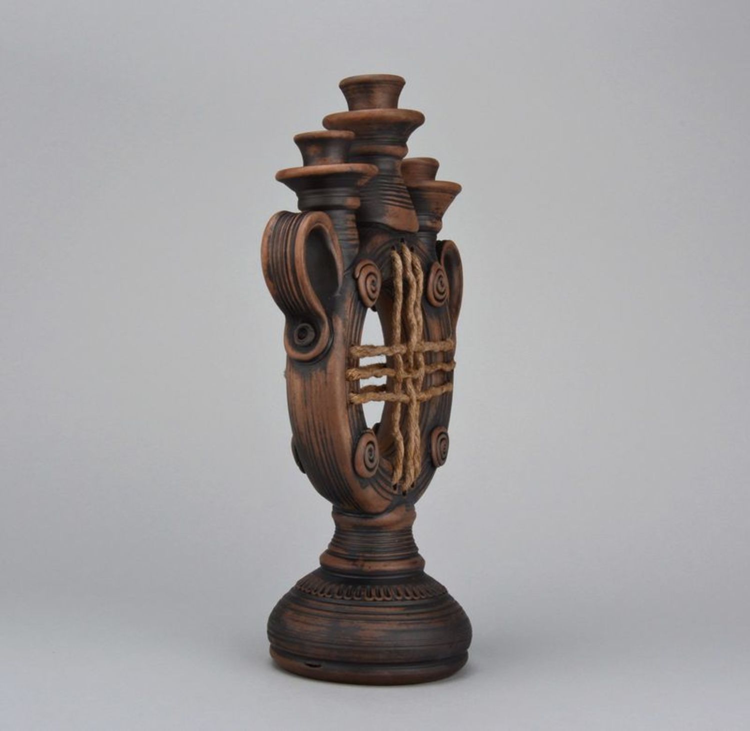Candelabro marrone in ceramica a tre candele fatto a mano decorazioni di casa  foto 2