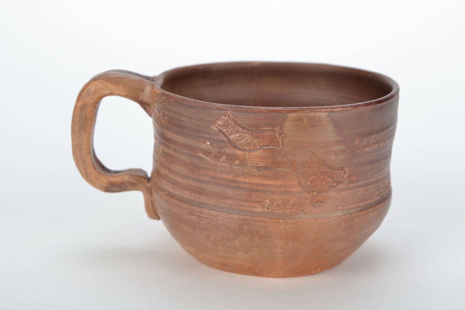 Brown clay coffee cup with  birds cave drawings with handle photo 4