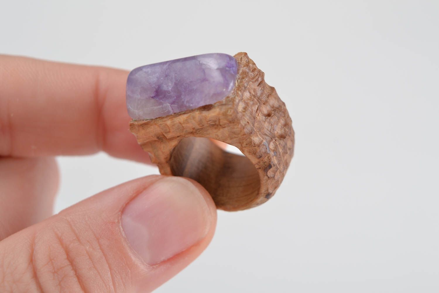 Handmade stylish jewelry ring carved of wood with natural tender violet stone photo 2