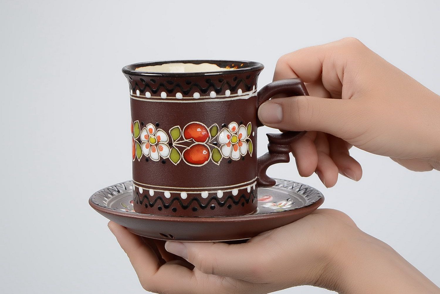 Ceramic glazed decorative brown te or coffee cup with handle, sauce and floral pattern photo 5