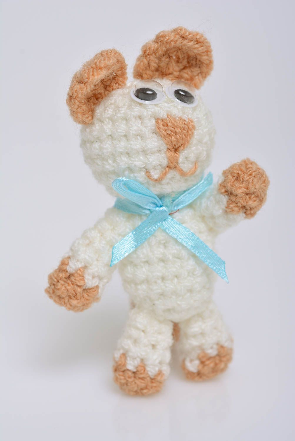 Small white children's handmade soft toy cat crocheted of acrylic threads photo 1