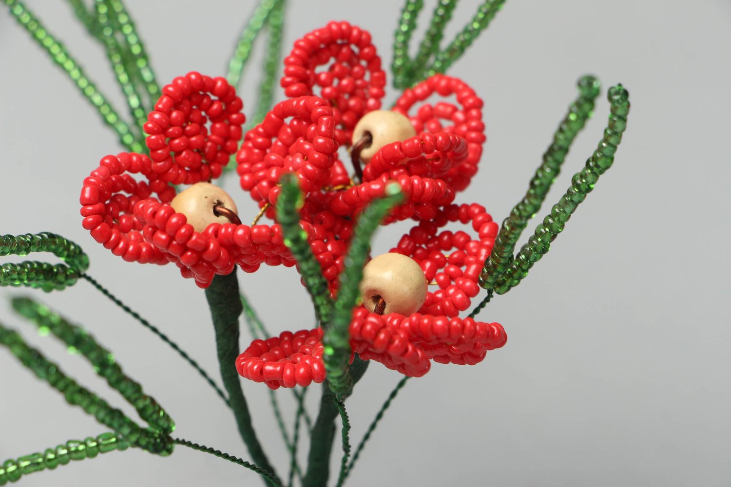 Decorative beaded flower composition of red color photo 3