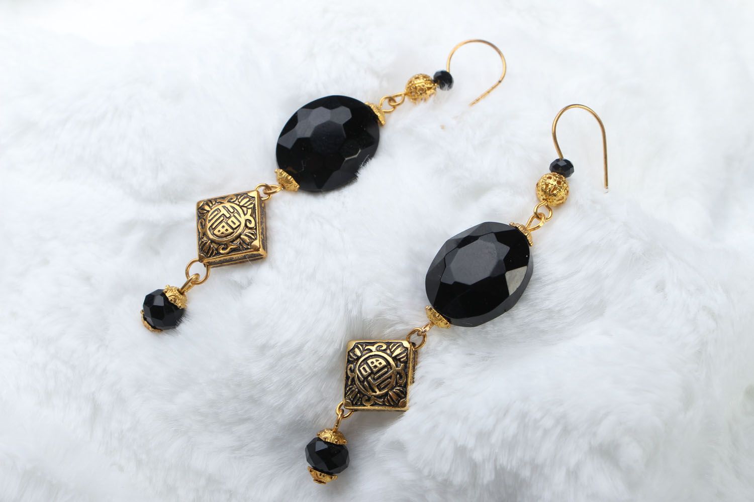 Long earrings with black crystal photo 1
