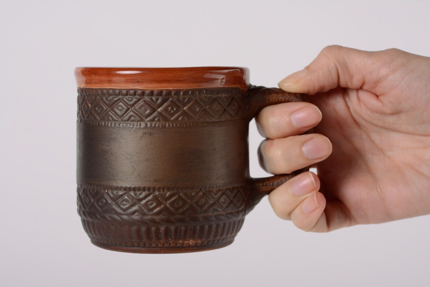 Rustic clay glazed cup with geometrical patterns and handle photo 5