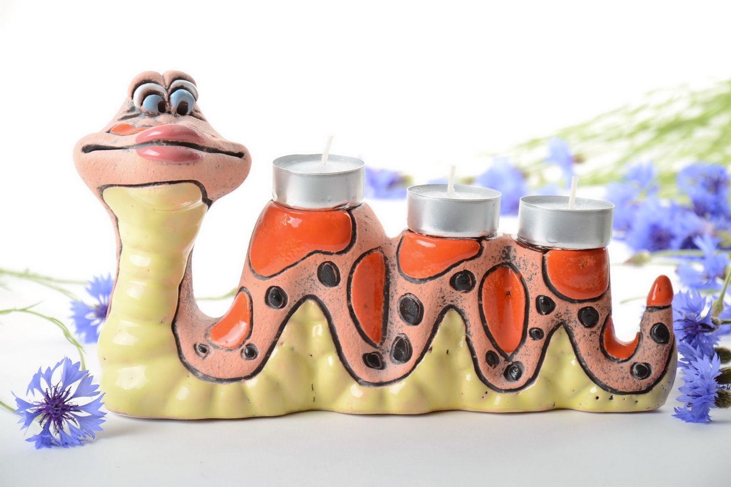 Handmade colorful decorative painted ceramic candlestick in the shape of snake photo 1