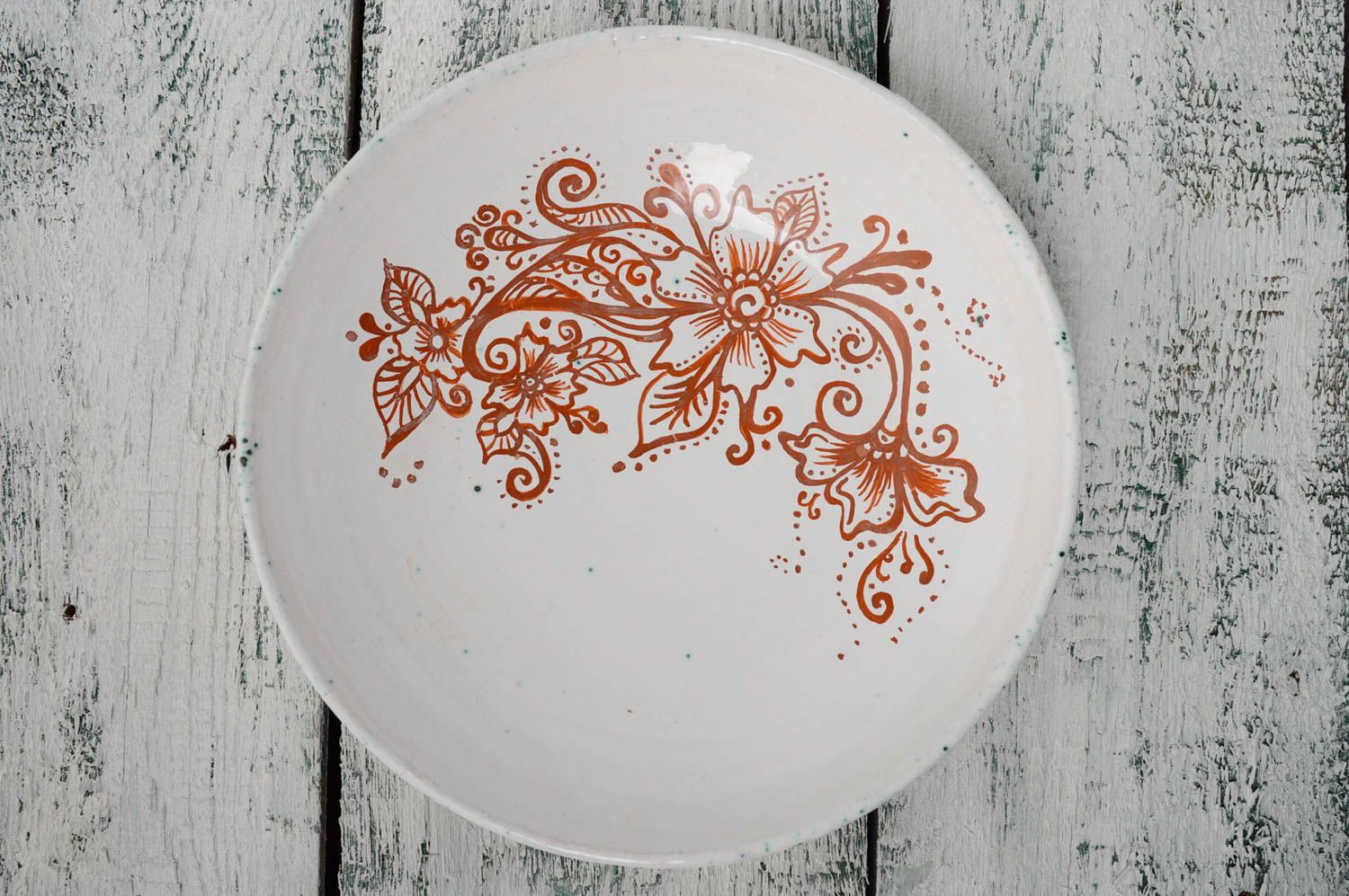 Painted ceramic plate with flowers photo 4