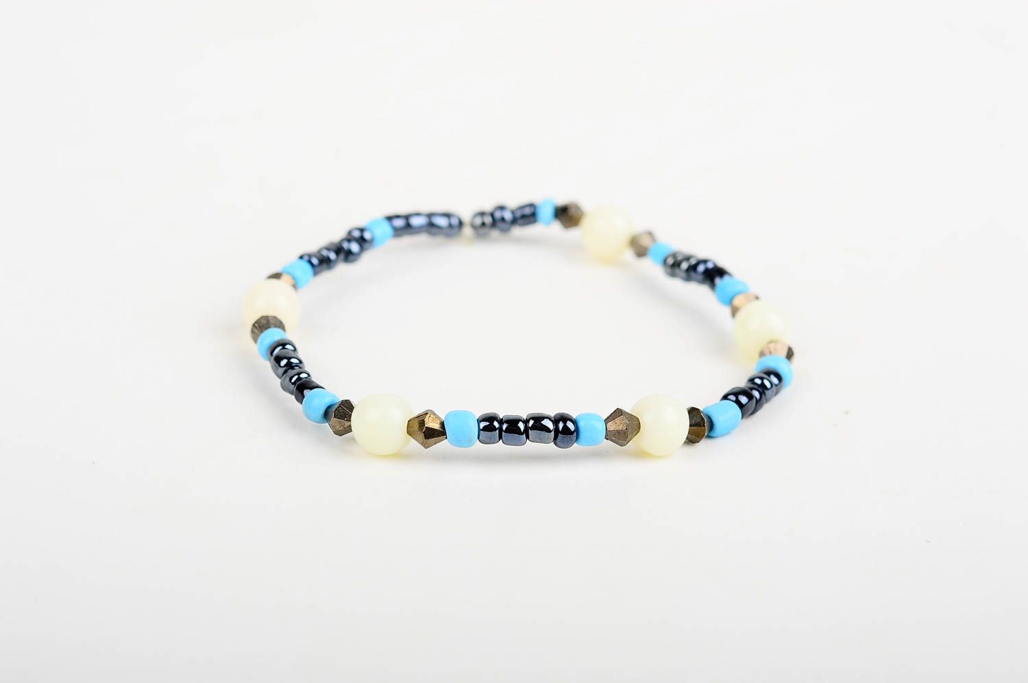Elastic stretchy unisex bracelet made of black and blue beads  photo 3