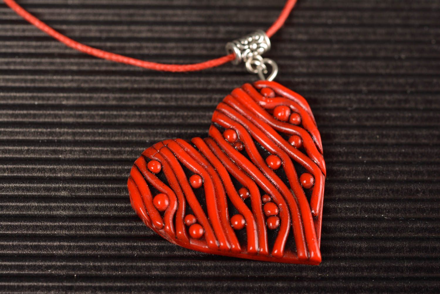 Handmade designer heart shaped polymer clay pendant red and black on cord photo 3