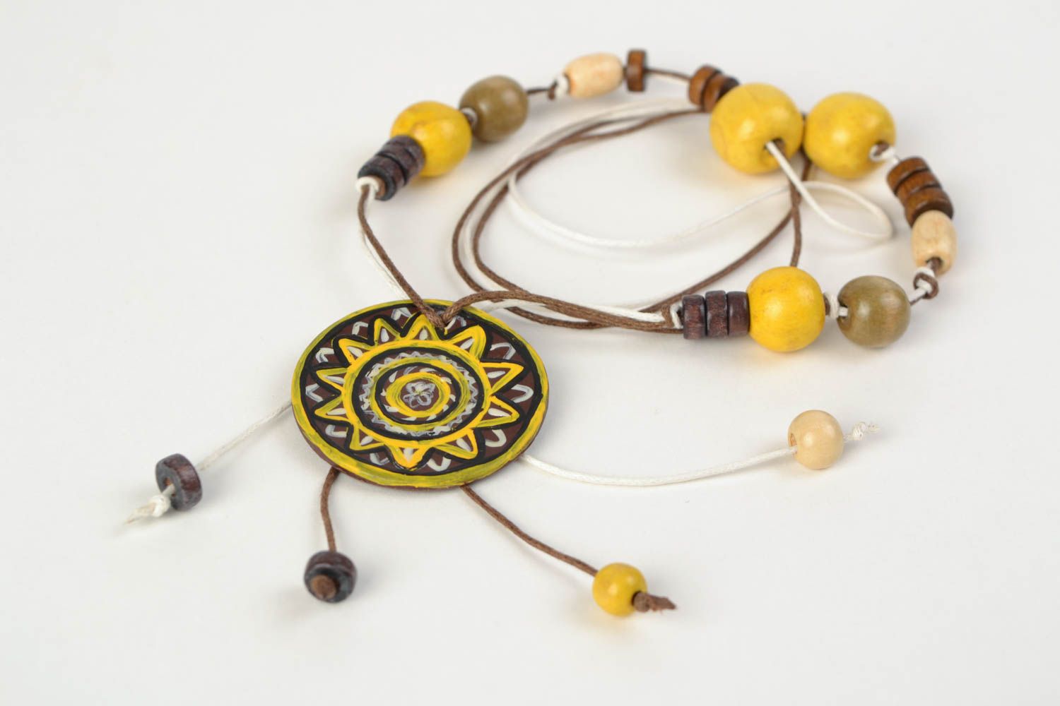 Handmade ethnic yellow and black polymer clay neck pendant on a cord with beads  photo 4