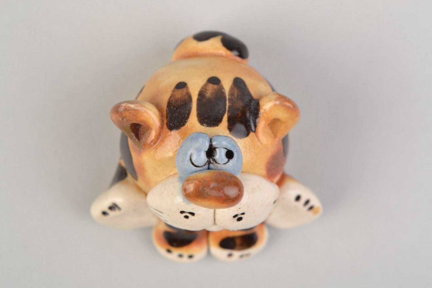 Handmade funny ceramic figurine of colorful sitting tiger painted with glazes photo 3
