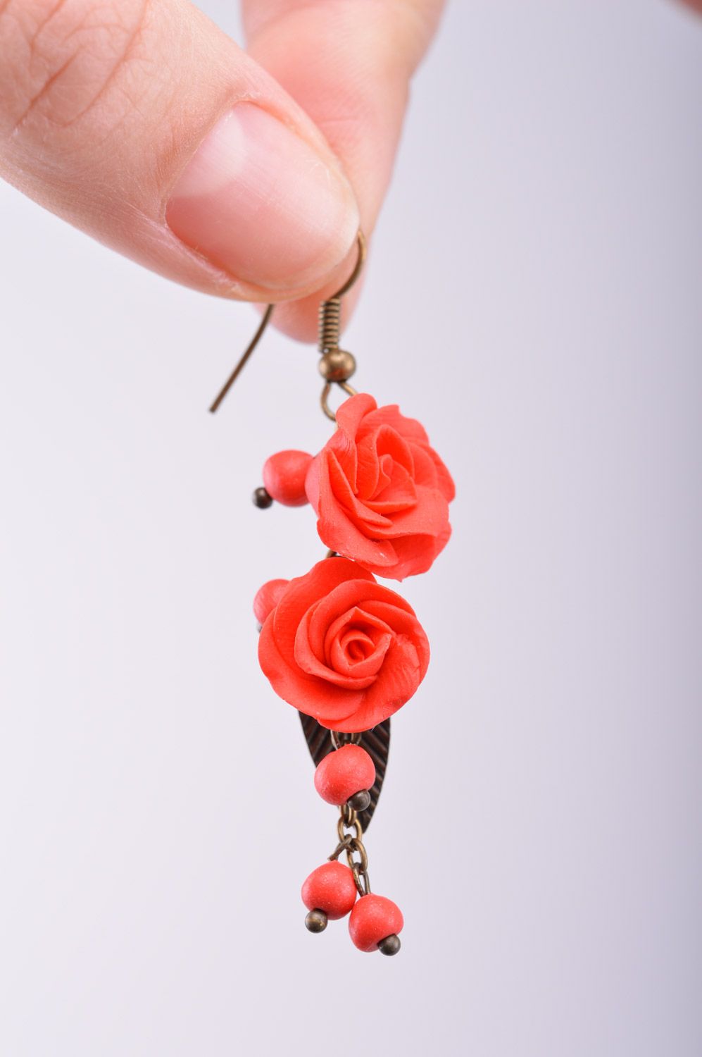 Handmade women's polymer clay flower earrings with charms in the shape of roses and beads photo 1