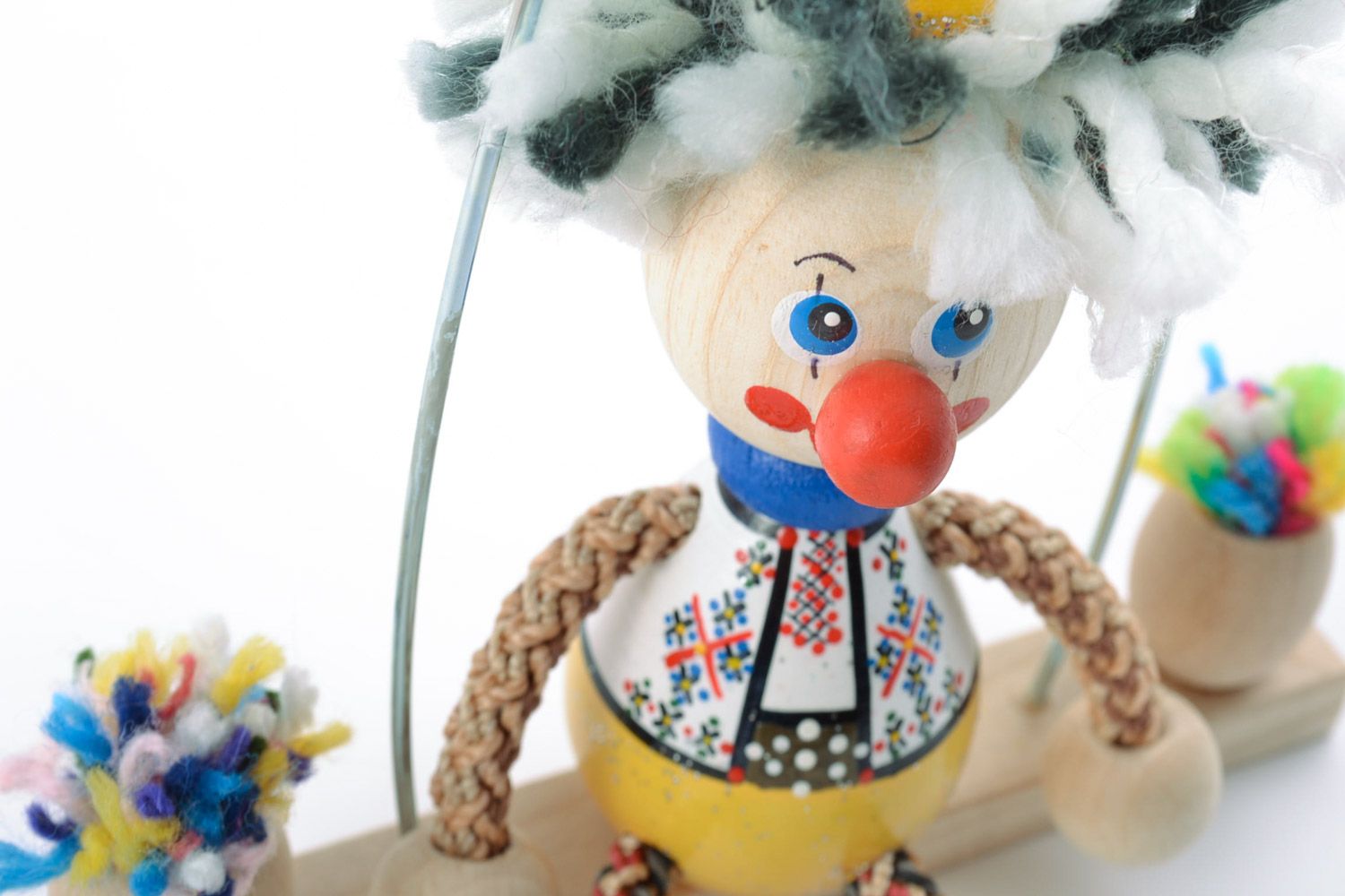 Handmade eco friendly painted varnished wooden toy cute clown on swing for kids photo 3