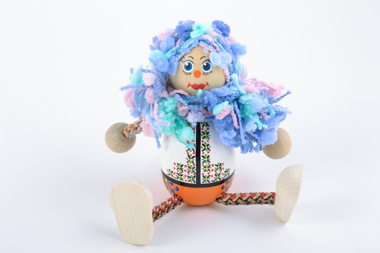 Painted handmade wooden toy for the child in the form of a bright girl doll photo 4