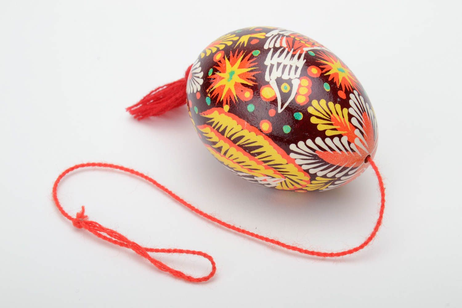 Handmade decorative painted Easter egg ornamented in Lemkiv style with red tassel photo 2