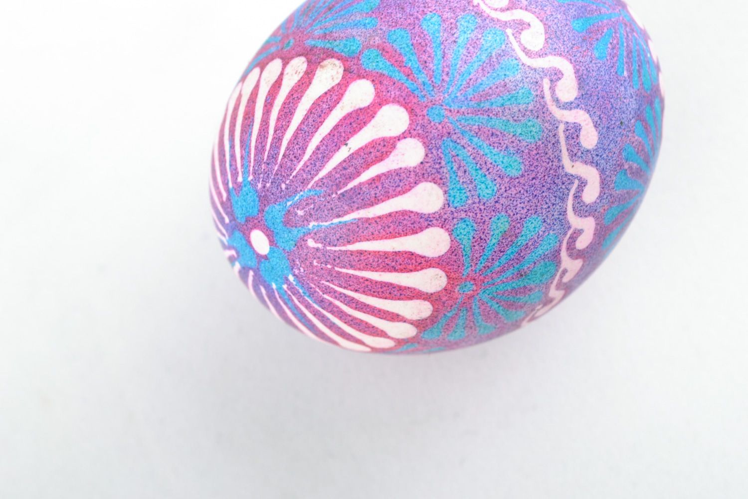 Handmade Easter egg painted with wax in Lemkiv style in blue and violet colors photo 5