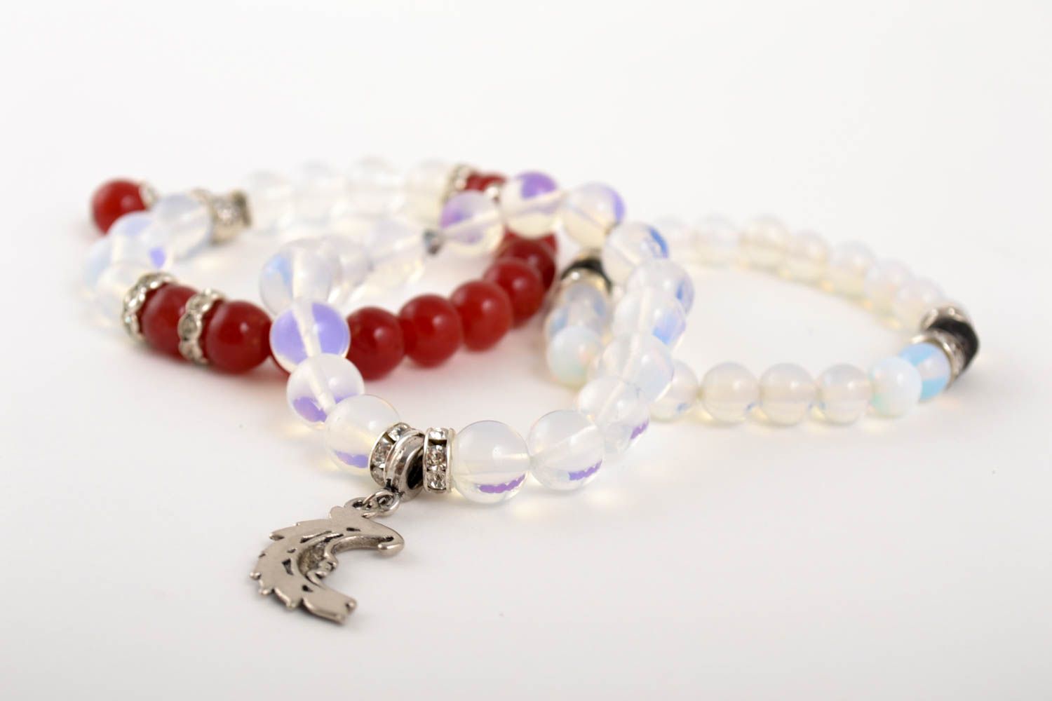Set of three transparent beaded gemstone bracelets with charms for girls photo 4