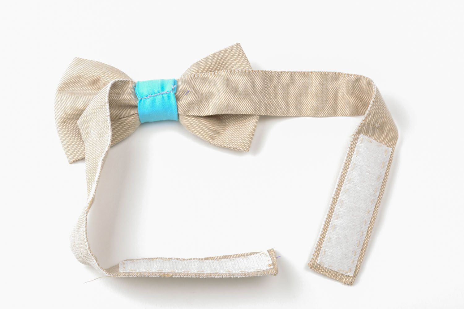 Beige and blue bow tie photo 5