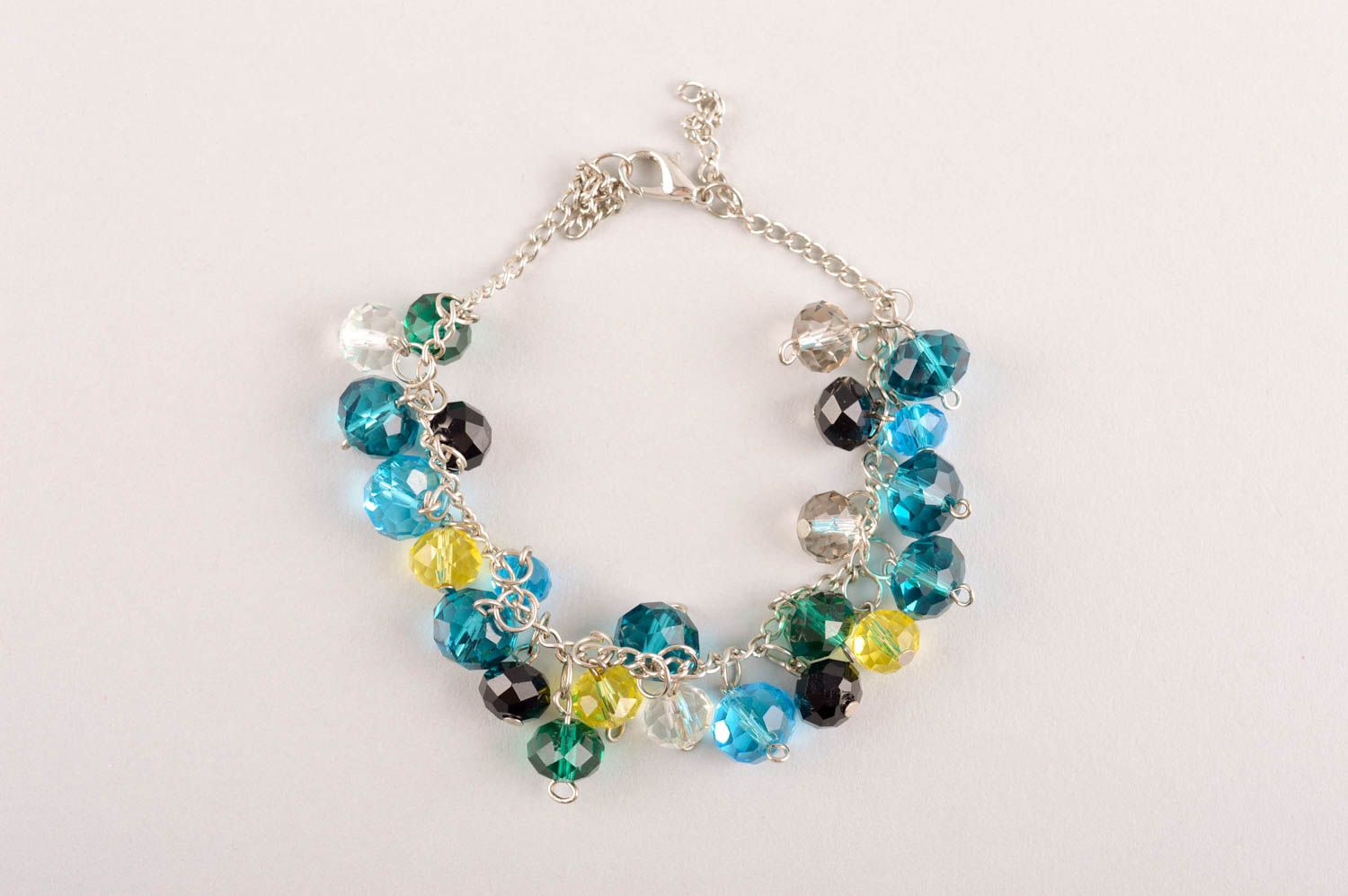 Handmade chain beaded bracelet made of transparent yellow, green, blue beads for young girls photo 2