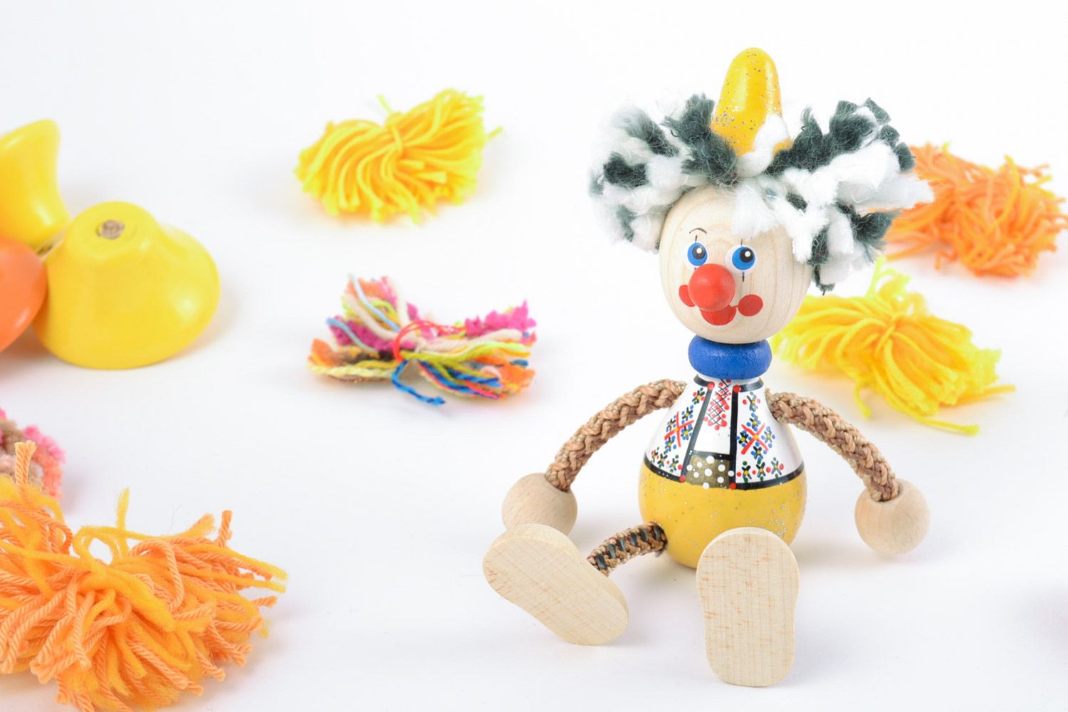 Wooden handmade eco friendly toy bright funny little clown painted manually photo 1