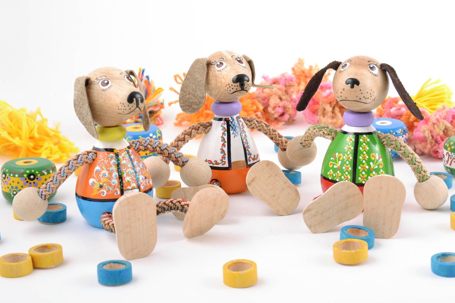 Set of handmade colorful painted wooden eco toys dogs with cord paws for kids  photo 1
