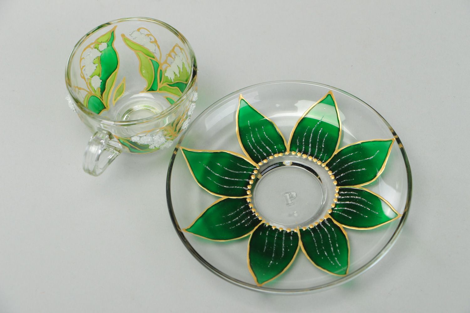 Unique clear glass teacup with hand-painted gold and green floral pattern photo 2