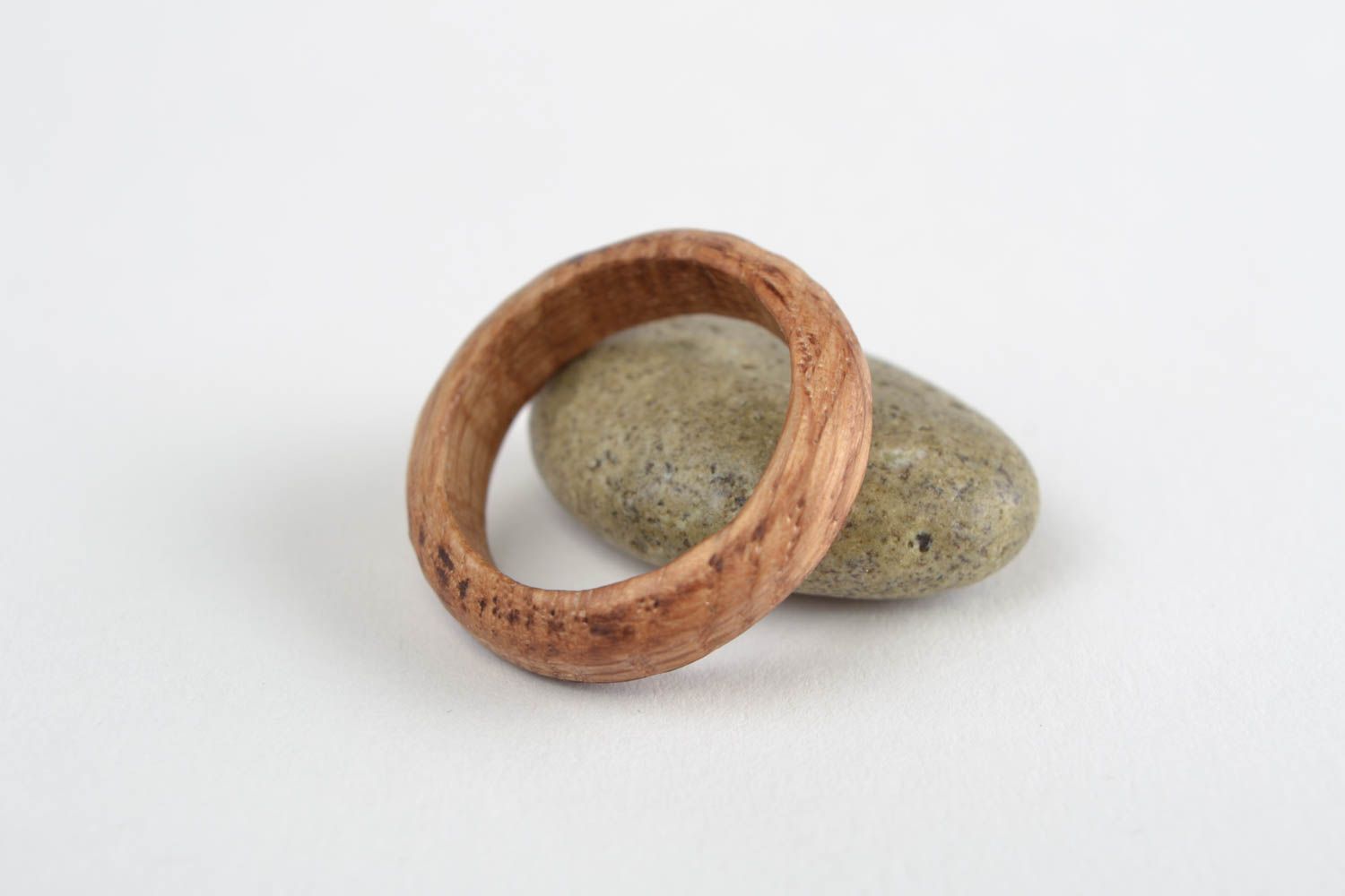 Simple handmade jewelry ring carved of natural oak wood of laconic design photo 1