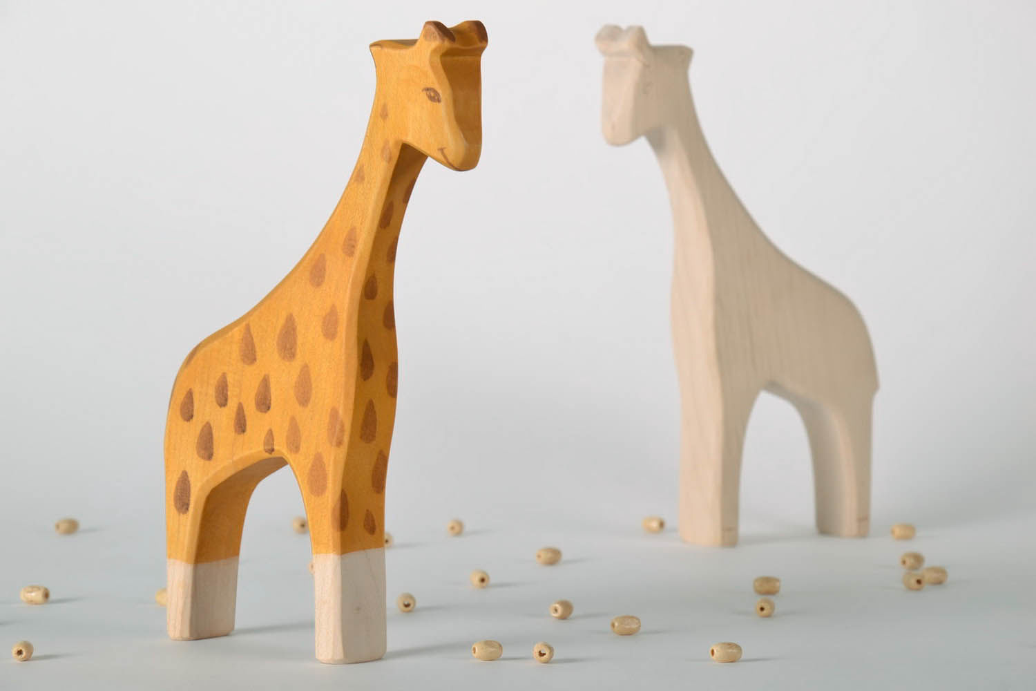 Handgemachtes Spielzeug aus Holz Giraffe foto 2