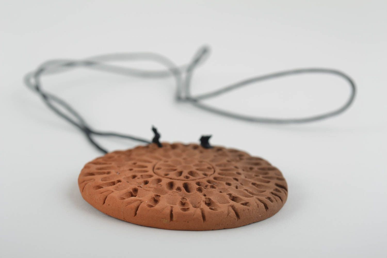 Handmade unusual pendant made of red clay on lace in ethnic style photo 4