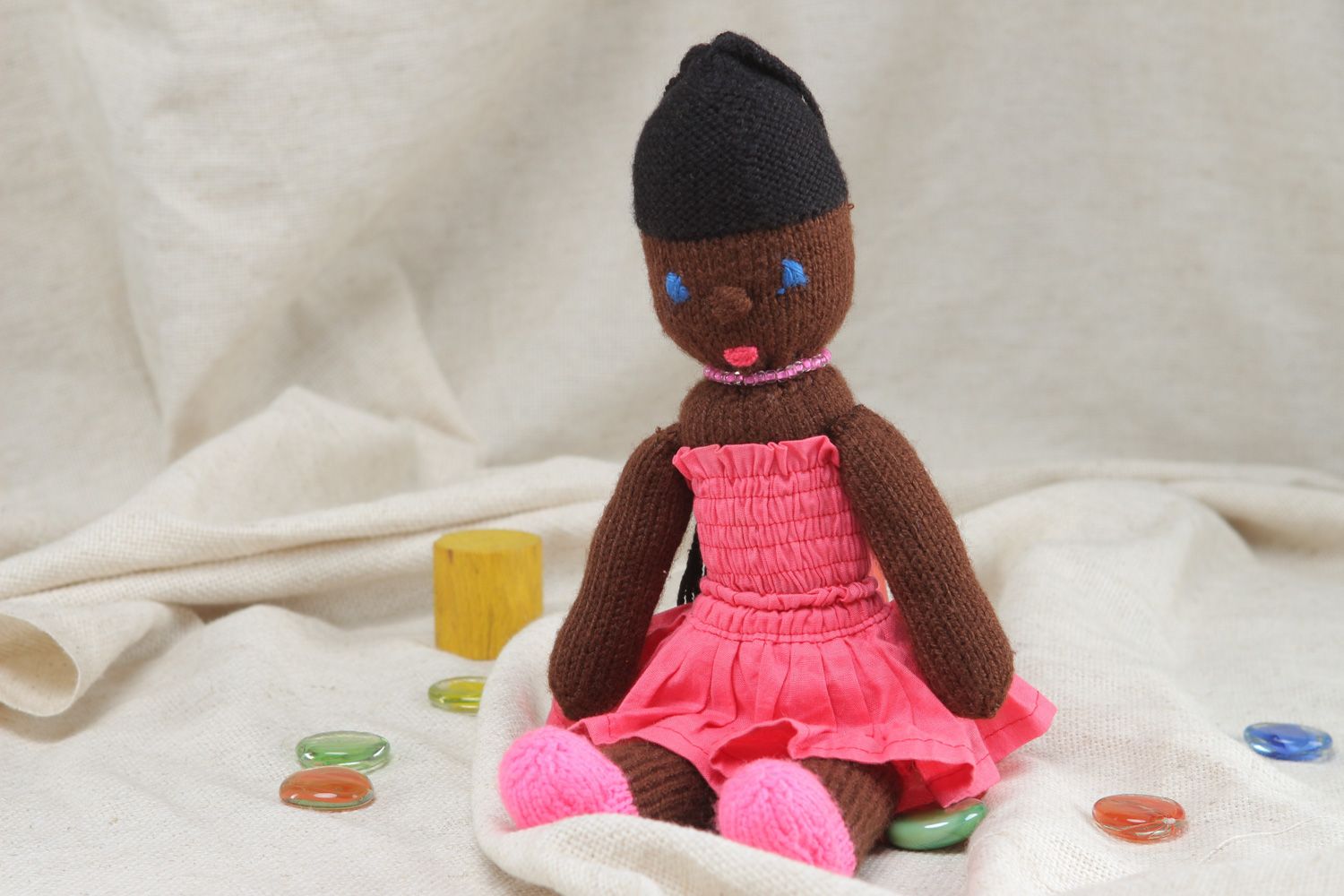 Handmade soft toy knitted of acrylic threads Mulatto in pink dress for little girl photo 5