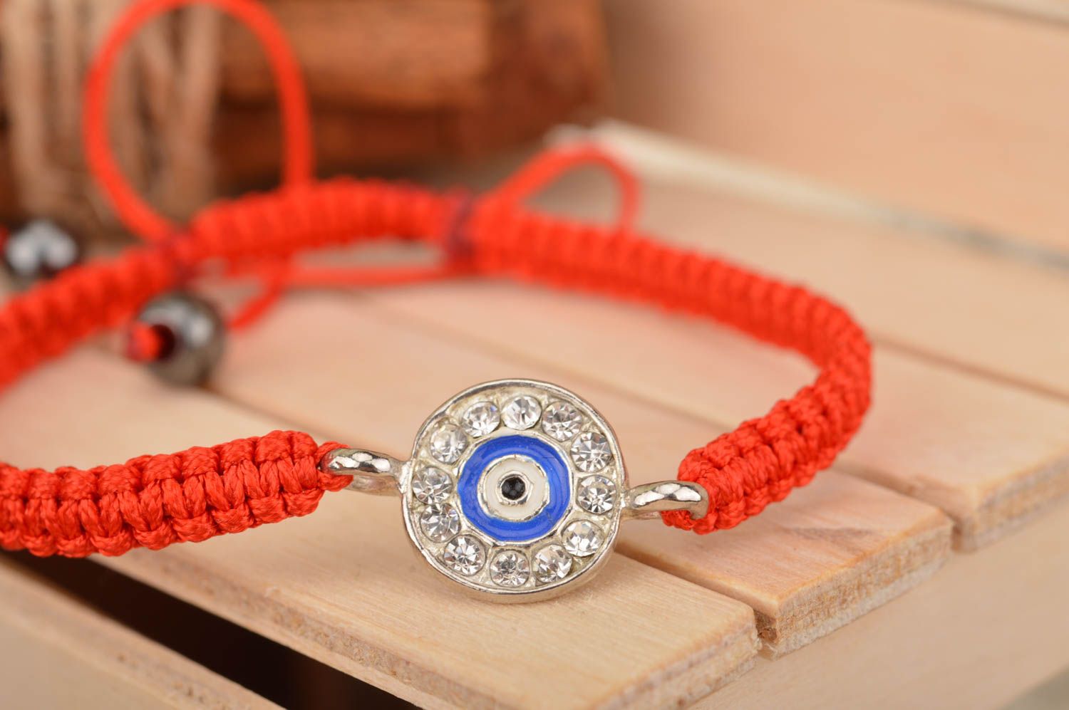 Beautiful handmade friendship bracelet woven of red threads designer jewelry photo 1