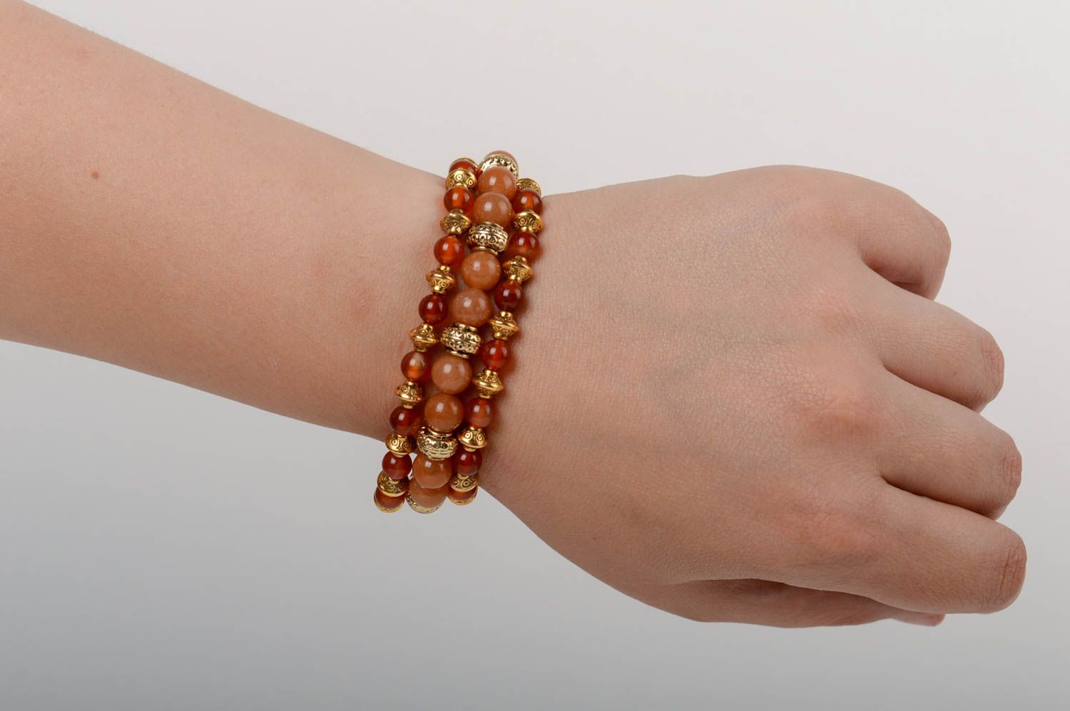 Schönes handmade Armband mit Tigerauge und Rhodonit dreireihig stilvoll für Dame foto 5
