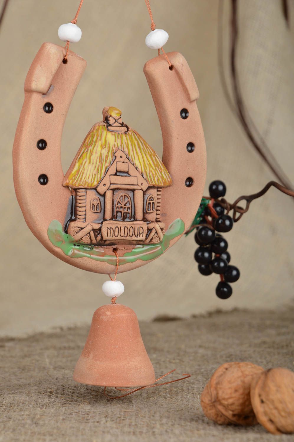 Ceramic handmade interior pendant for home horseshoe with a house and bell photo 1