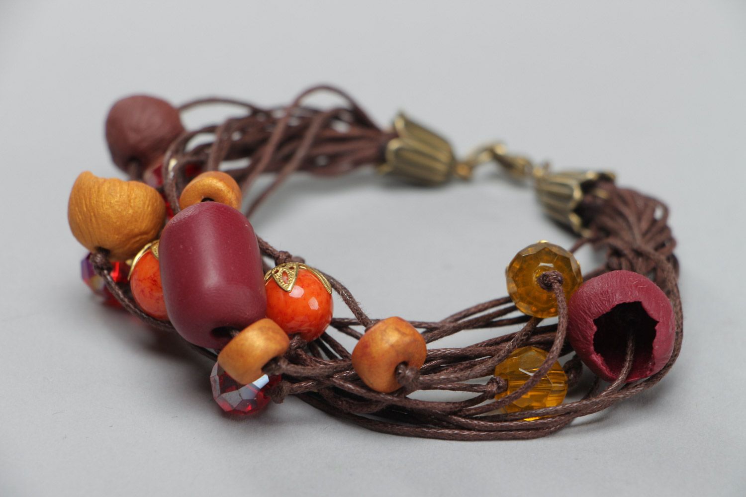 Handmade designer beautiful wrist bracelet made of polymer clay in brown colors photo 2