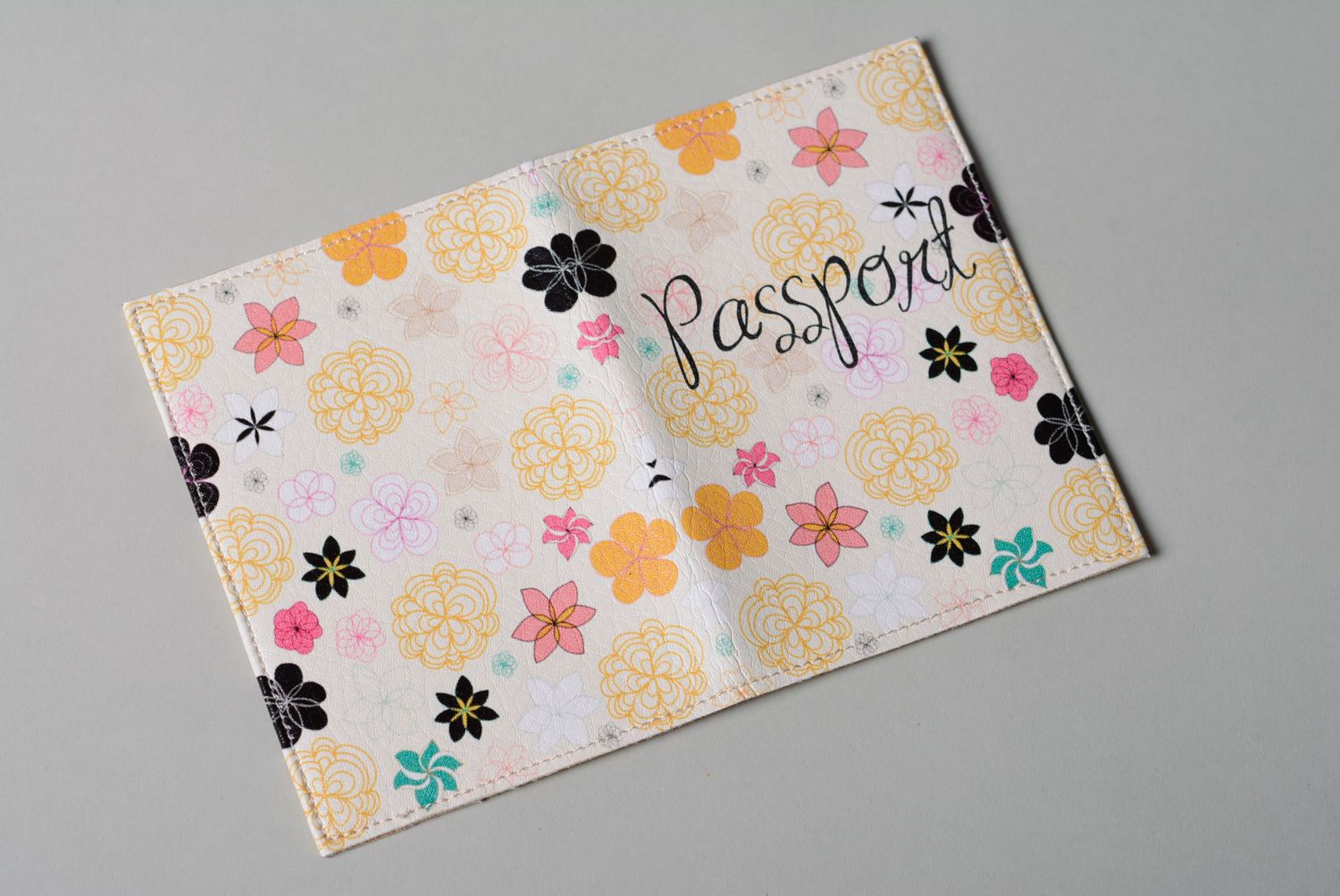 Homemade leather passport cover with flower print photo 2