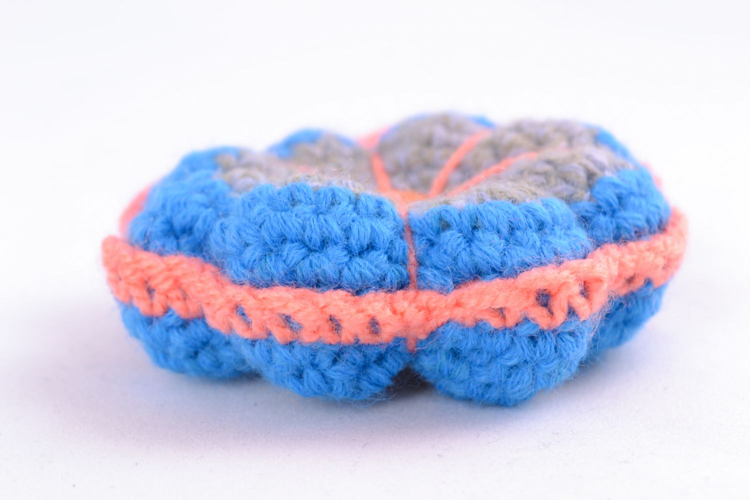 Giocattolo a maglia fatto a mano pupazzo morbido a forma di fiore con occhiello foto 5